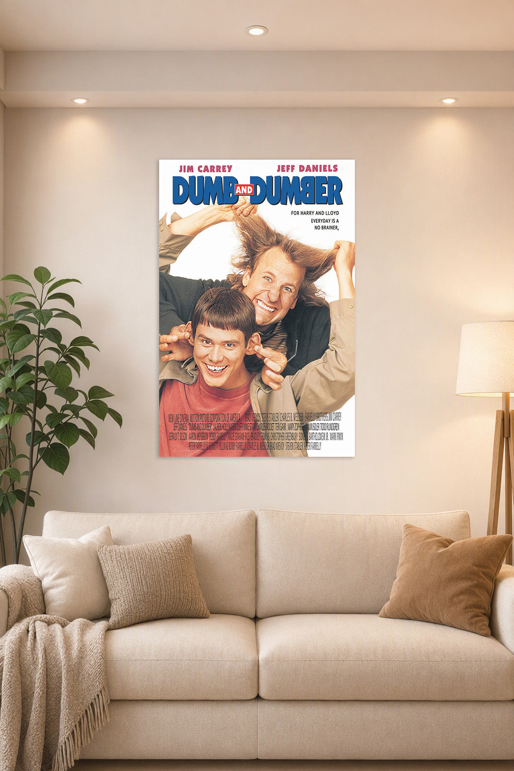 Dumb and Dumber Movie Poster in a bright living room above a beige sofa.