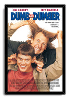 Dumb and Dumber framed wall art print with a black border, blue title lettering, and the two comedy stars posing playfully.