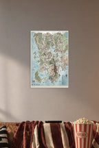 Dungeons & Dragons Faerûn Map in a cozy movie room above a brown sofa with popcorn.