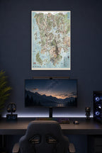 Dungeons & Dragons Faerûn Map in a gaming desk setup above a monitor.