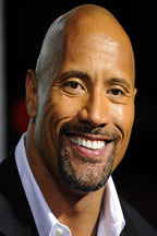 Dwayne The Rock Johnson poster features a close-up smiling portrait in a black jacket and open white shirt against black.