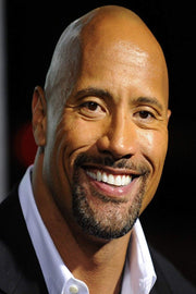 Dwayne The Rock Johnson poster features a close-up smiling portrait in a black jacket and open white shirt against black.