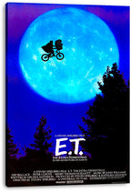 E.T. The Extra-Terrestrial canvas wall art print featuring the flying bicycle silhouette, blue moon, dark forest, and film credits.