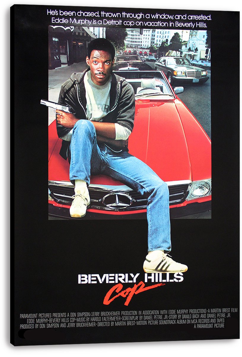 Beverly Hills Cop canvas wall art print featuring Eddie Murphy on a red Mercedes with a pistol against a busy city street.