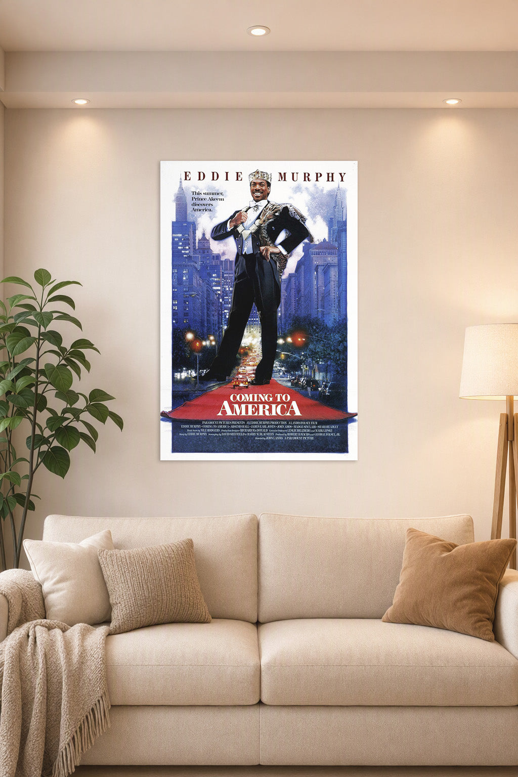 Eddie Murphy Prince Akeem Coming to America in a bright living room above a beige sofa.