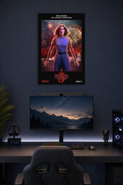 Eleven Stranger Things Fireworks in a gaming desk setup above a monitor.