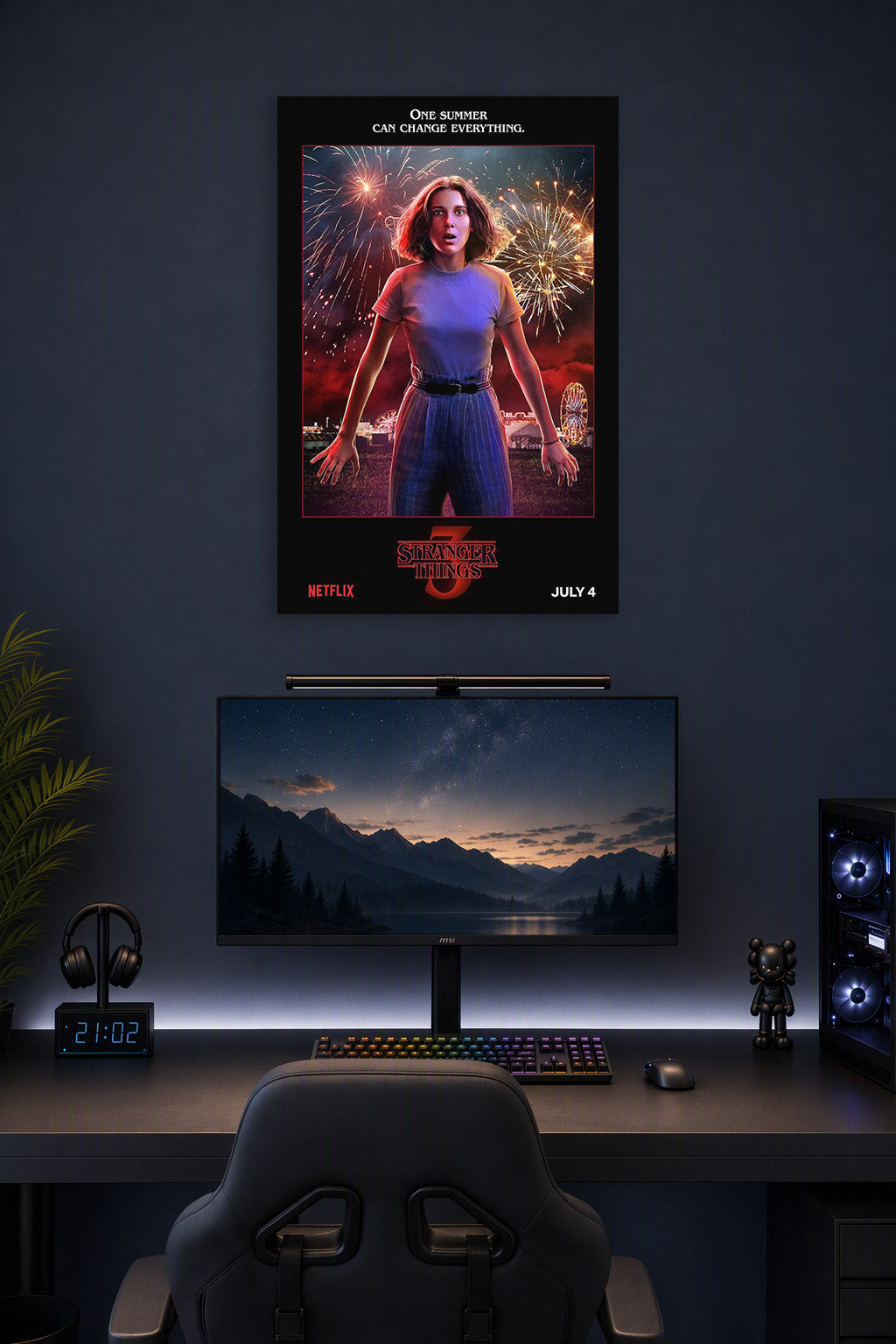 Eleven Stranger Things Fireworks in a gaming desk setup above a monitor.