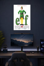 Elf Movie Poster in a gaming desk setup above a monitor.