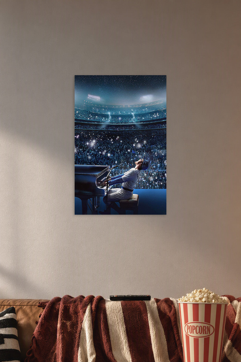 Elton John Rocketman Concert in a cozy movie room above a brown sofa with popcorn.