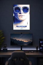 Elton John Rocketman Movie in a gaming desk setup above a monitor.