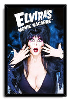 Elvira's Movie Macabre framed wall art print depicts Elvira’s startled gaze, dark hair and outstretched hands beneath bold white lettering.