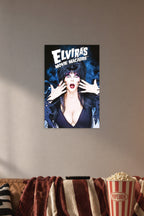 Elvira's Movie Macabre in a cozy movie room above a brown sofa with popcorn.