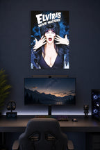 Elvira's Movie Macabre in a gaming desk setup above a monitor.