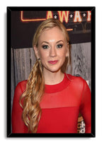 Emily Kinney framed wall art print featuring a close portrait of her in red, set within a glossy black rectangular frame.