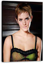 Emma Watson canvas wall art print features a close portrait of the actor in a green and black top against dark wood panels.