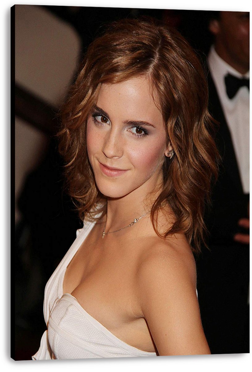 Emma Watson canvas wall art print with a red-carpet portrait of her in a white dress against a dark, blurred background.