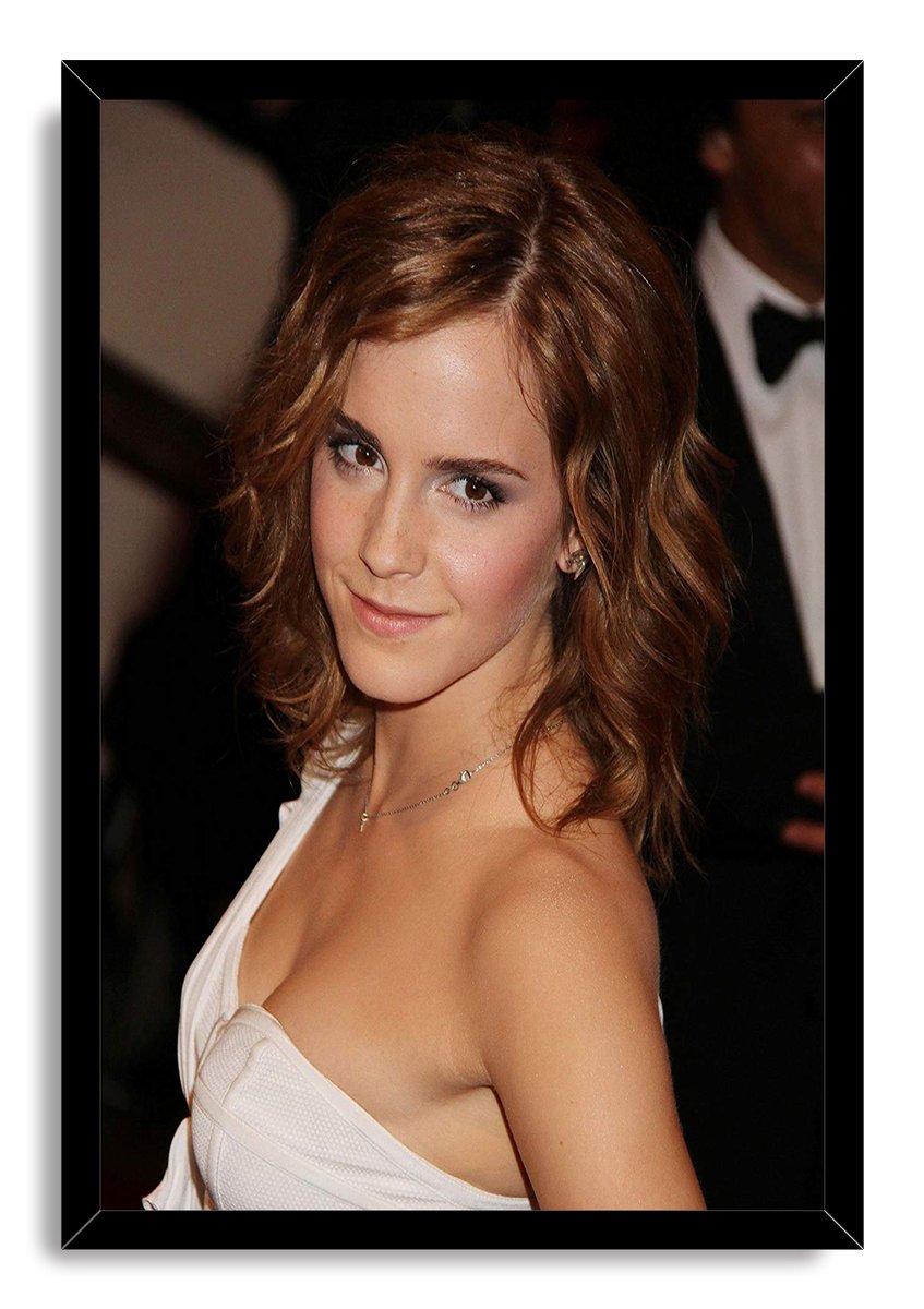 Emma Watson framed wall art print featuring her wavy brown hair, white dress, delicate necklace, and soft smile at a formal event.