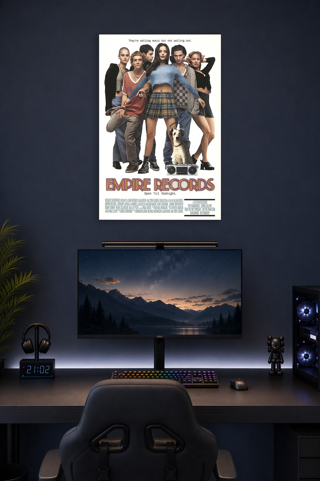 Empire Records Movie Poster in a gaming desk setup above a monitor.