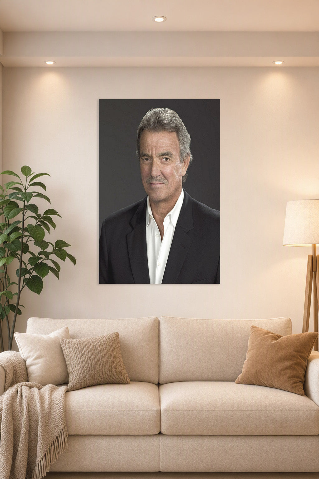 Eric Braeden in a bright living room above a beige sofa.