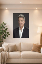 Eric Braeden in a bright living room above a beige sofa.