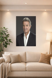 Eric Braeden in a bright living room above a beige sofa.