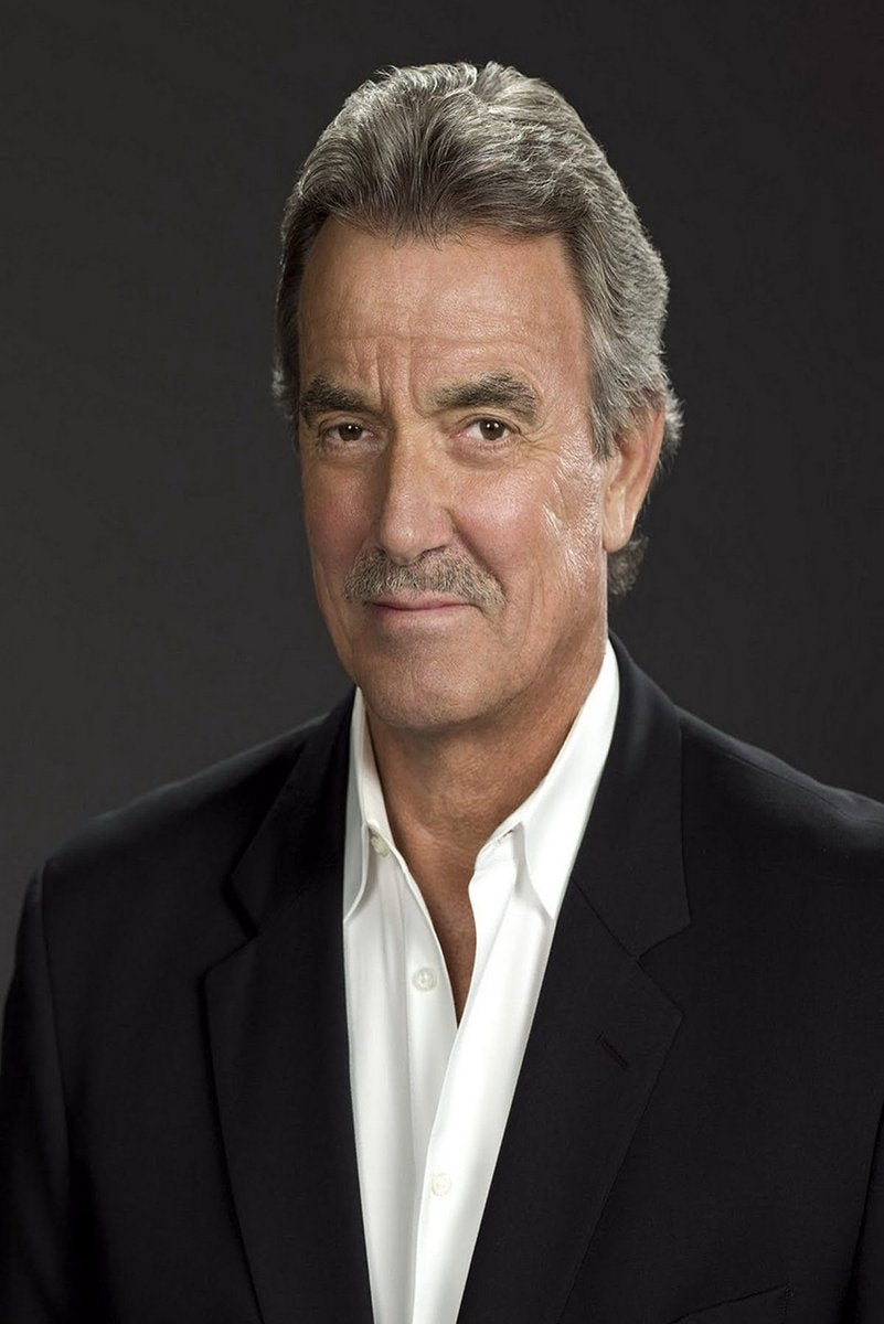Eric Braeden poster portrait featuring the gray-haired actor in a black blazer and open-collar white shirt against black.