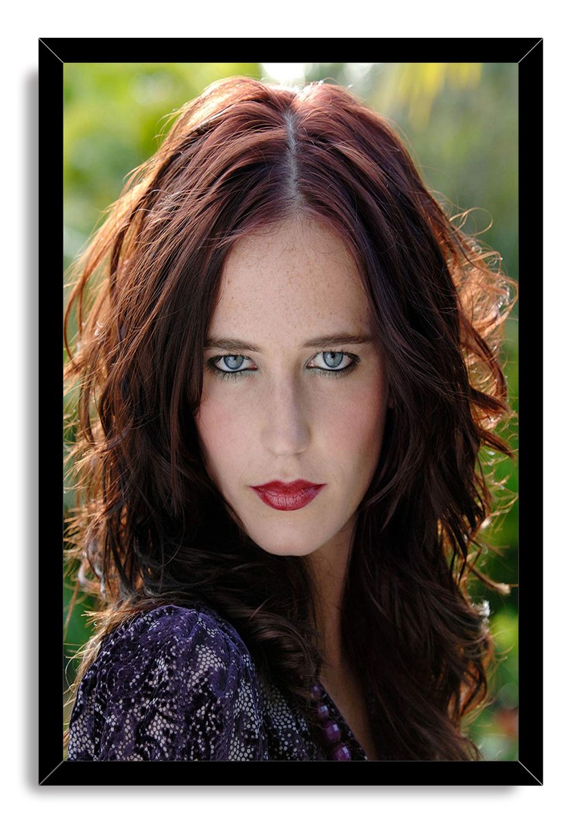 Eva Green framed wall art print features a direct portrait with dark auburn curls, blue eyes, red lips, and a glossy black frame.
