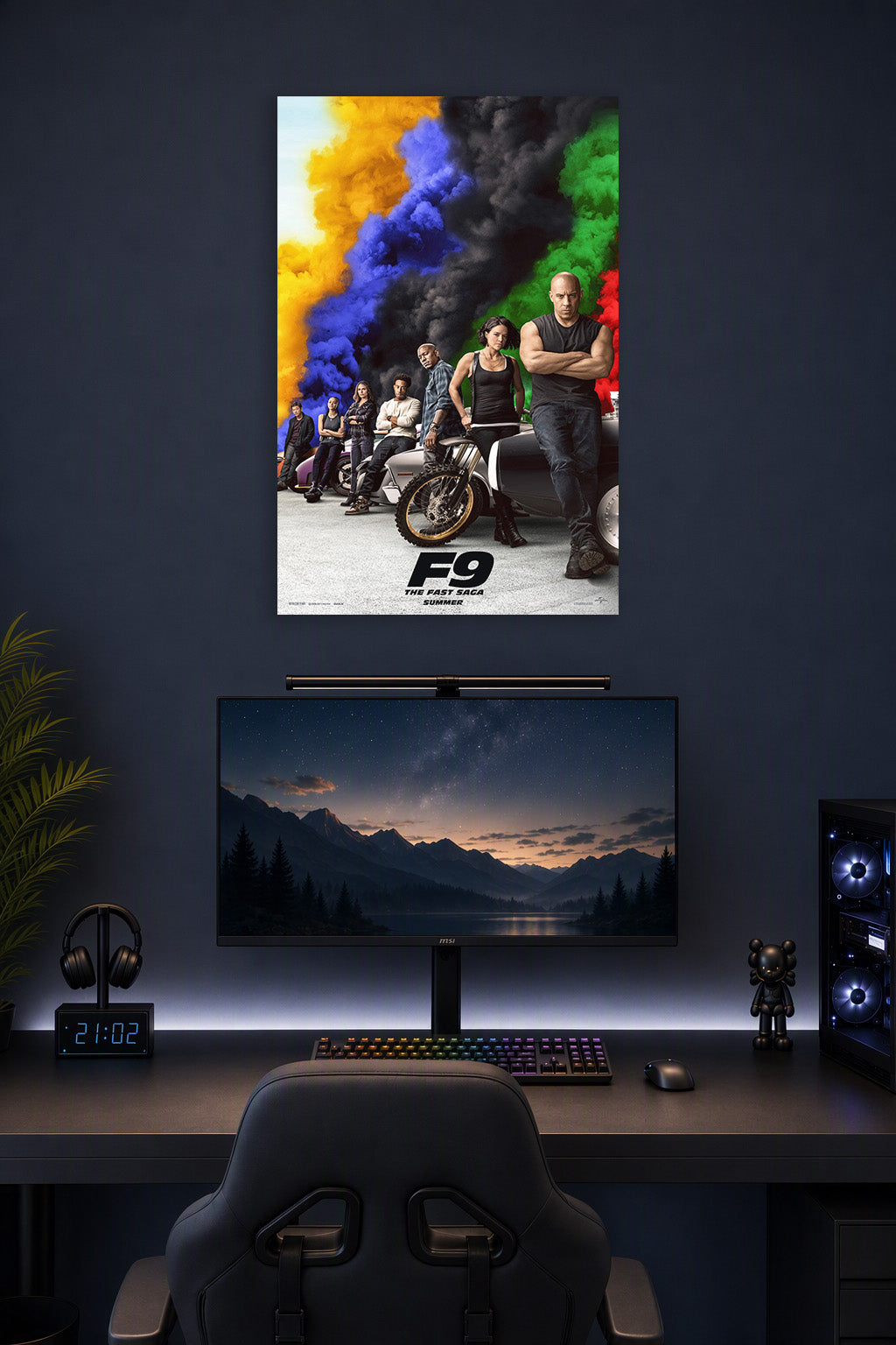 F9 The Fast Saga Movie Cast in a gaming desk setup above a monitor.
