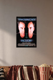 Face/Off John Travolta Nicolas Cage in a cozy movie room above a brown sofa with popcorn.
