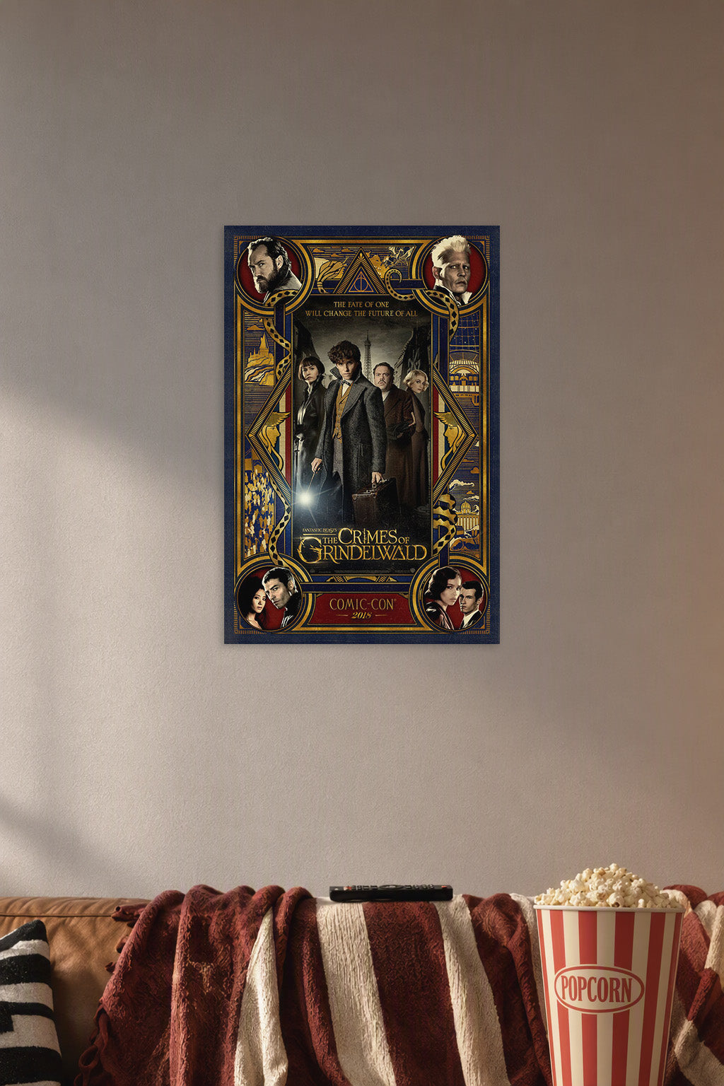 Fantastic Beasts The Crimes of Grindelwald Movie Cast in a cozy movie room above a brown sofa with popcorn.