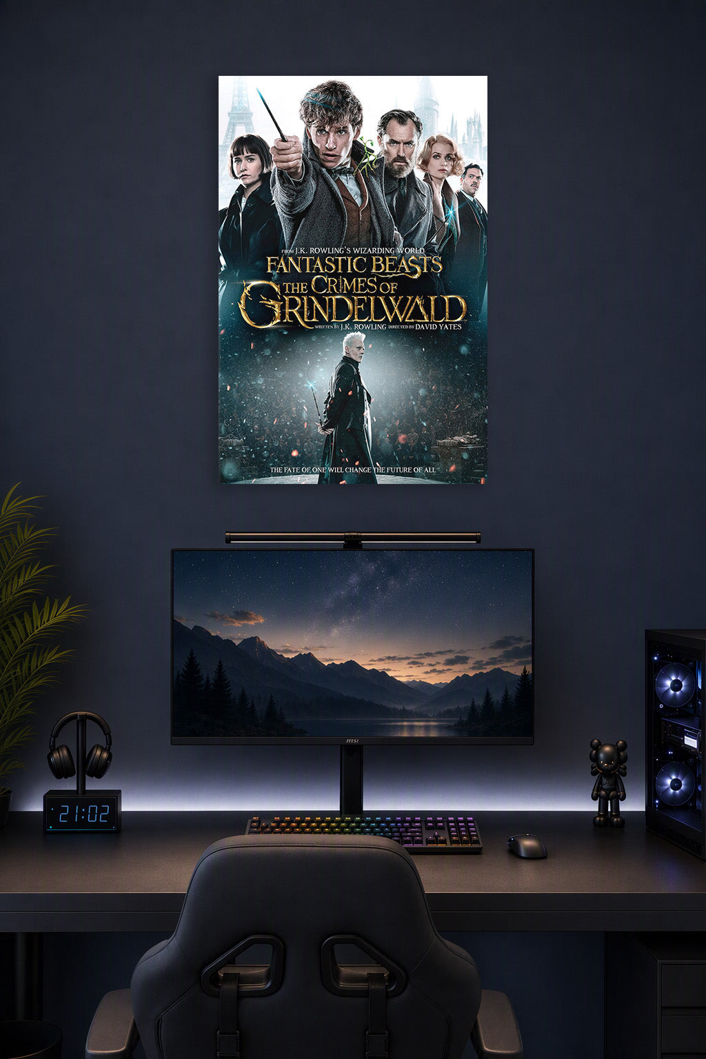 Fantastic Beasts: The Crimes of Grindelwald Movie Poster in a gaming desk setup above a monitor.