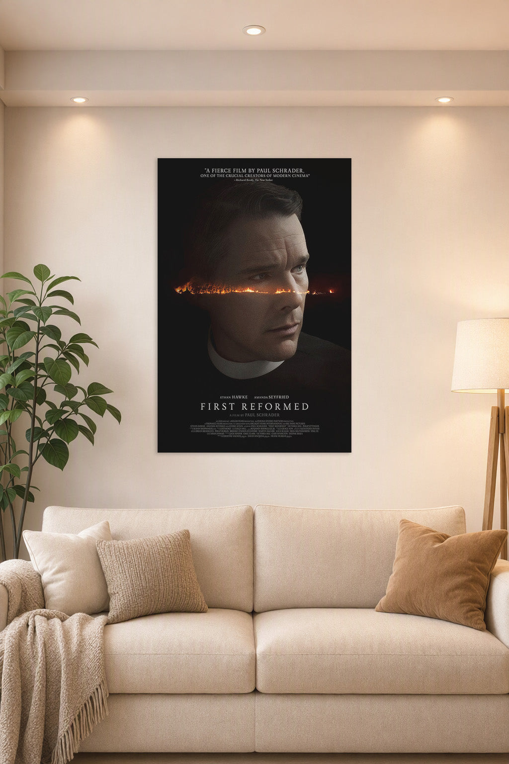 First Reformed Ethan Hawke in a bright living room above a beige sofa.