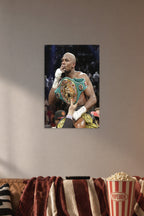 Floyd Mayweather in a cozy movie room above a brown sofa with popcorn.