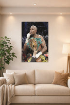 Floyd Mayweather in a bright living room above a beige sofa.