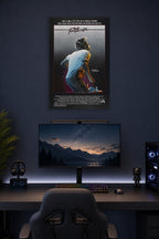 Footloose Movie in a gaming desk setup above a monitor.