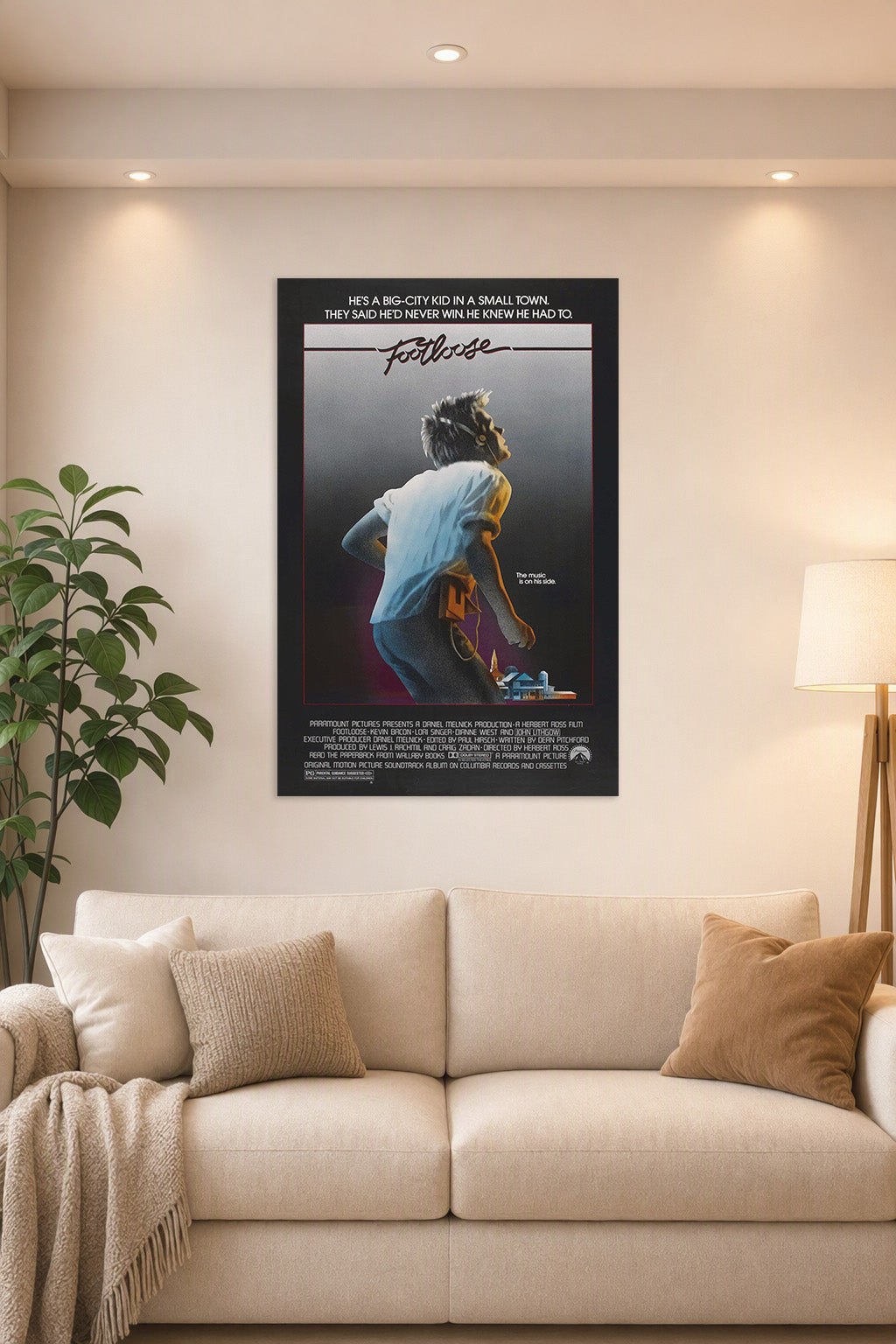 Footloose Movie in a bright living room above a beige sofa.