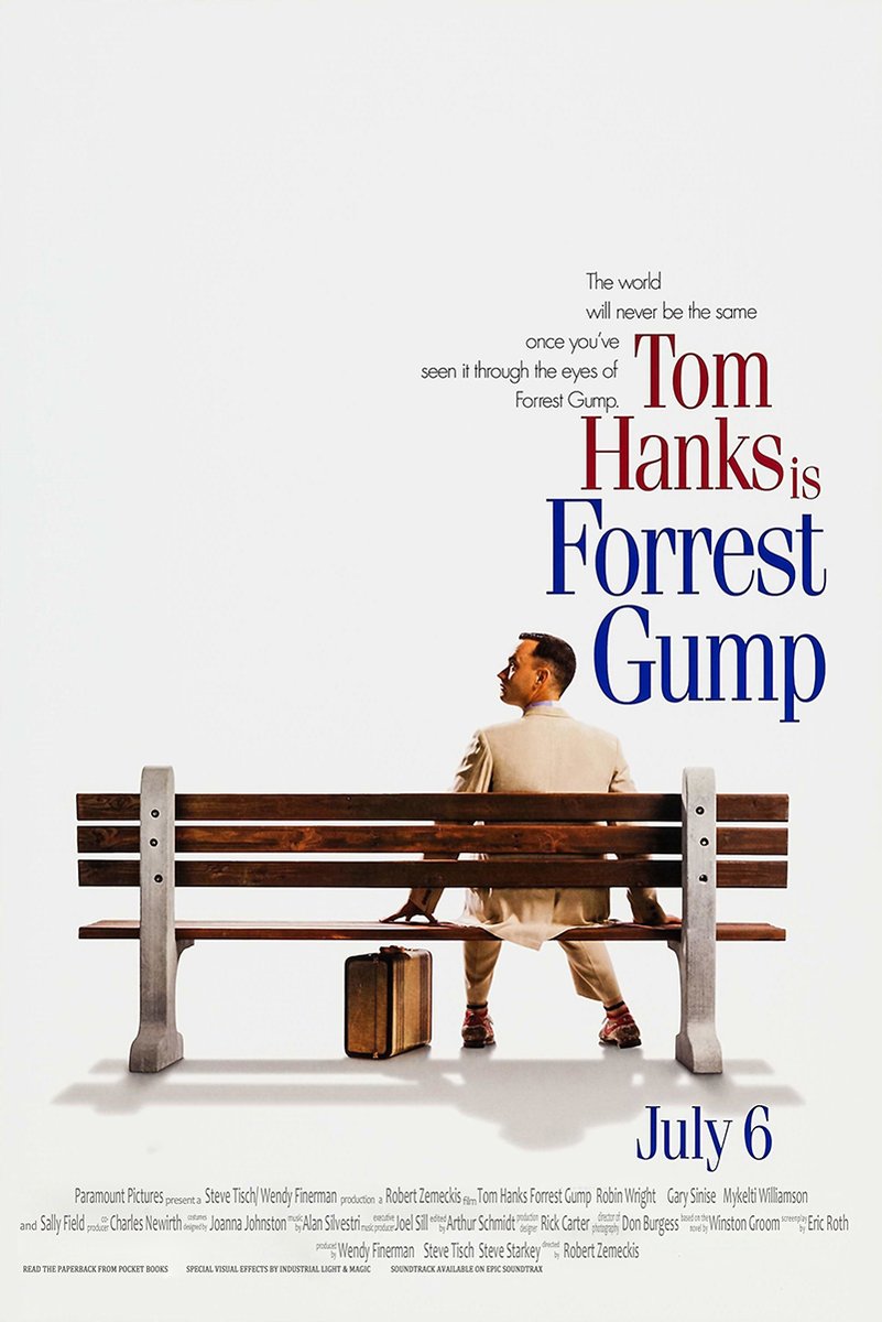 Forrest Gump poster features Tom Hanks seated behind a wooden bench with a brown suitcase, bold red and blue title text, and a white background.