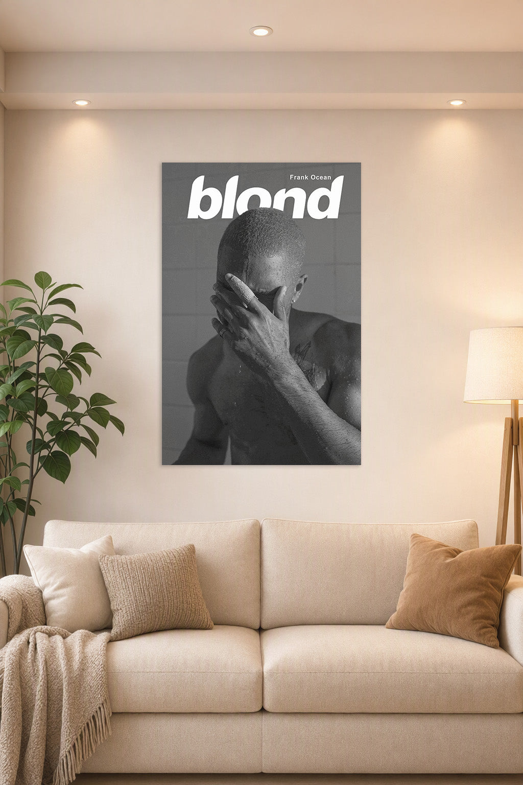 Frank Ocean Blond Album Cover in a bright living room above a beige sofa.