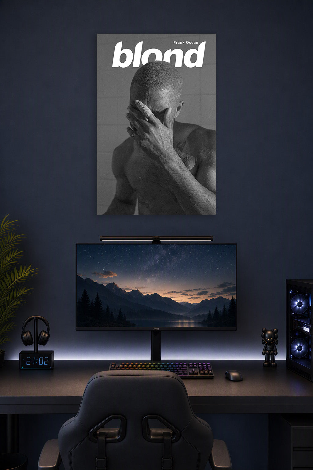 Frank Ocean Blond Album Cover in a gaming desk setup above a monitor.