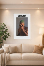 Frank Ocean Blonde Album Cover in a bright living room above a beige sofa.