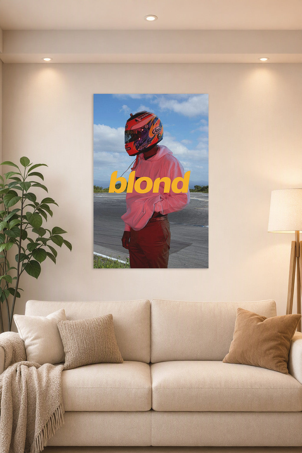 Frank Ocean Blonde Album Cover in a bright living room above a beige sofa.