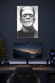 Frankenstein Boris Karloff B004008U2Q in a gaming desk setup above a monitor.