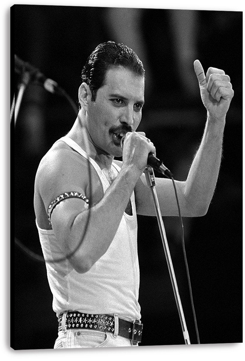 Freddie Mercury canvas wall art print displays a black-and-white concert portrait with a microphone, white tank top, and raised thumb.