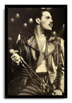Freddie Mercury framed wall art print in black and white, posed with a microphone stand and leather jacket onstage.