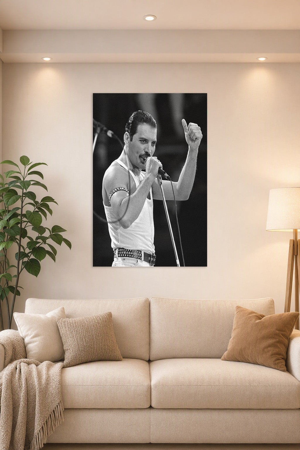 Freddie Mercury in a bright living room above a beige sofa.