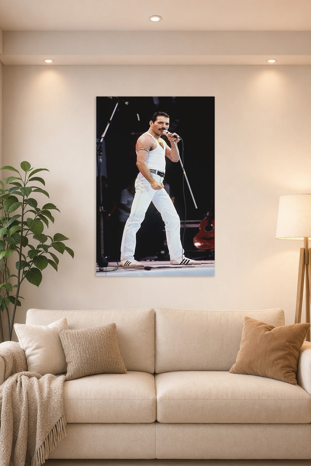 Freddie Mercury in a bright living room above a beige sofa.