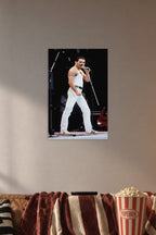 Freddie Mercury in a cozy movie room above a brown sofa with popcorn.