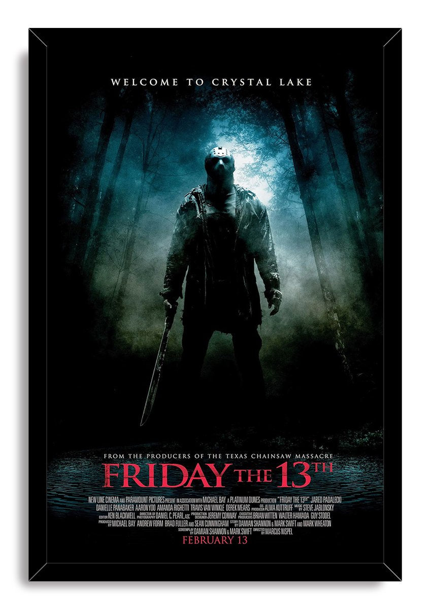 Friday the 13th framed wall art print depicts hockey-masked Jason standing with a machete in a dark, fog-filled woodland.