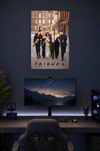 Friends TV Show Cast in a gaming desk setup above a monitor.