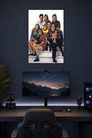 Full House Cast Family in a gaming desk setup above a monitor.